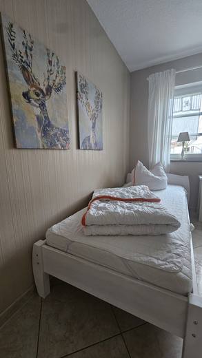 Einzelbett im zweiten Schlafzimmer